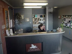Front reception desk with the Chappelle logo