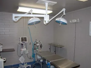 Surgical suite with operating table and lights